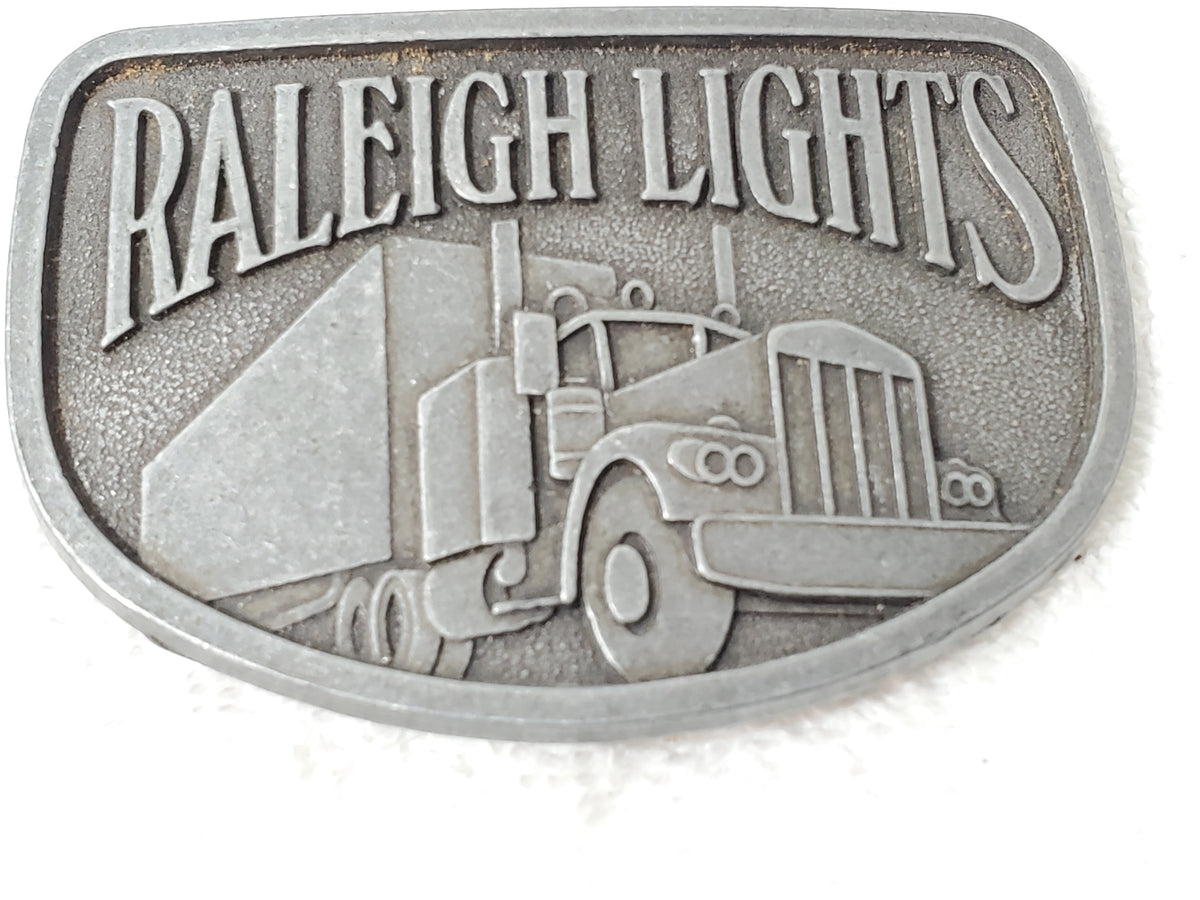 Vintage Raleigh Lights Semi Truck Tractor Trailer Promotional Belt Buckle
