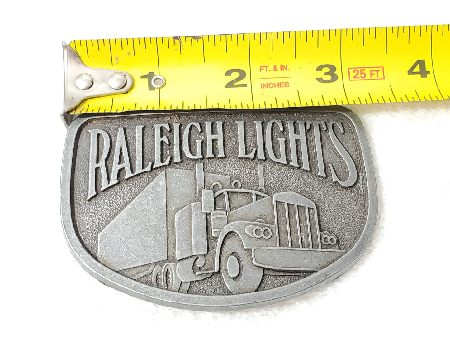Vintage Raleigh Lights Semi Truck Tractor Trailer Promotional Belt Buckle