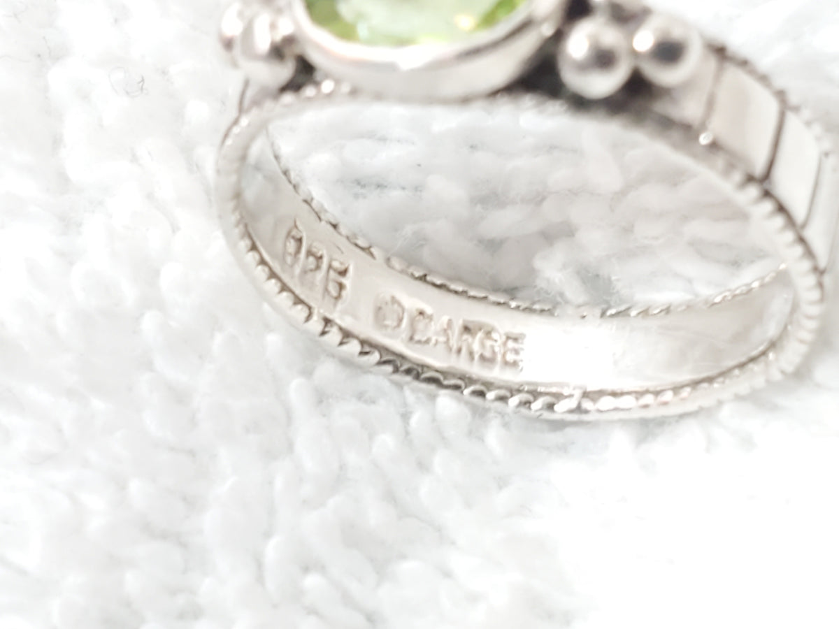 Vintage 925 Sterling Silver Oval Peridot Bezel Solitaire Ring by DEARSE